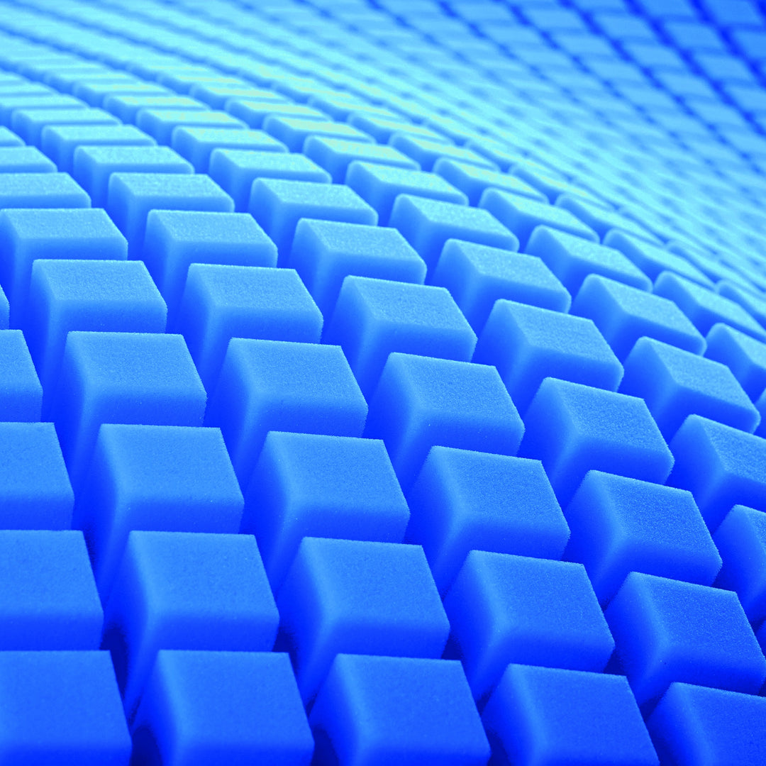 Grid of blue foam cubes with a blue background